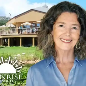 Trauma Solutions: A woman with curly gray hair smiles in front of a building with a balcony and umbrellas. The "Sunrise Ranch" logo is in the bottom left corner.