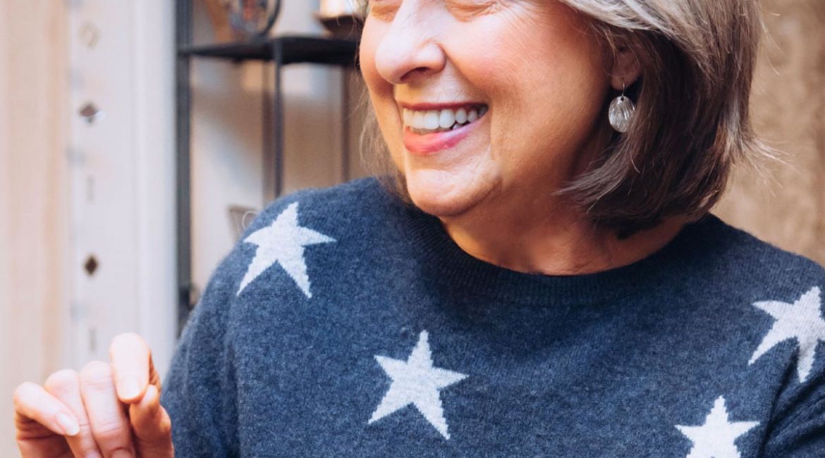 Patti Elledge wearing a star-patterned sweater.
