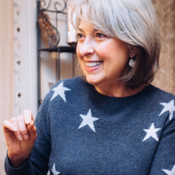 Patti Elledge wearing a star-patterned sweater.